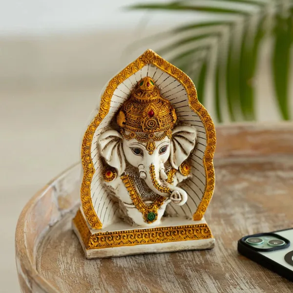 'Ganpati Head' Idol Decorative Showpiece Figurine (Resin, Handcrafted, 22.1 cm) 'Ganpati Head' Idol Decorative Showpiece Figurine (Resin, Handcrafted, 22.1 cm)