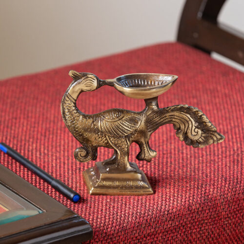 Glowing Peacock' Hand-Etched Carved Diya In Brass (730 grams)
