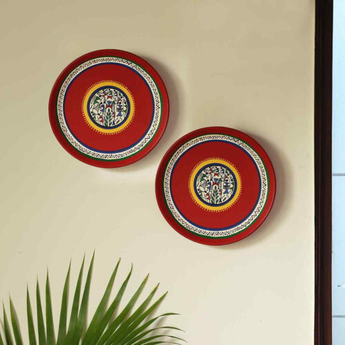 'The Warli Tales' Hand-painted Terracotta Wall Plates Wall Decor (20.3 cm, Set of 2, Red) 'The Warli Tales' Hand-painted Terracotta Wall Plates Wall Decor (20.3 cm, Set of 2, Red)